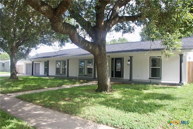 2704 Loma Vista Ave, Victoria, TX 77901 - single story home featuring a front yard, a garage, and a shingled roof