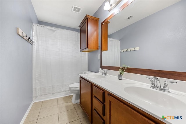 1103 Sugar Brook Dr, Temple, TX 76502 - full bath featuring double vanity, tile patterned flooring, and curtained shower