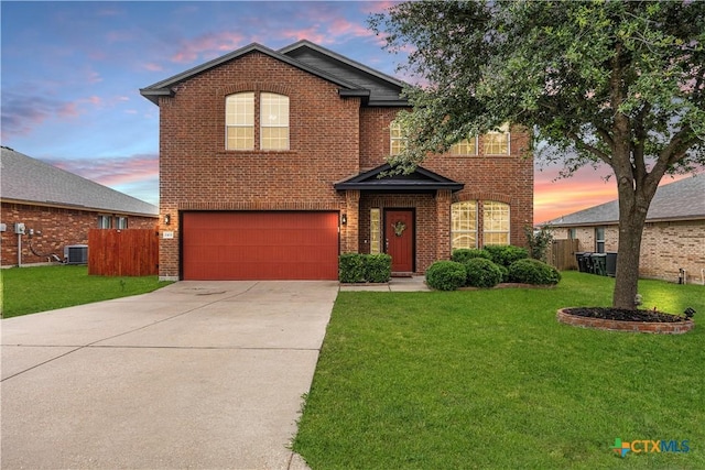 1103 Sugar Brook Dr, Temple, TX 76502 - traditional-style house featuring a garage, brick siding, and driveway