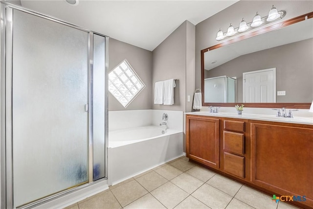 1103 Sugar Brook Dr, Temple, TX 76502 - full bath featuring a stall shower, a garden tub, double vanity, tile patterned floors, and lofted ceiling