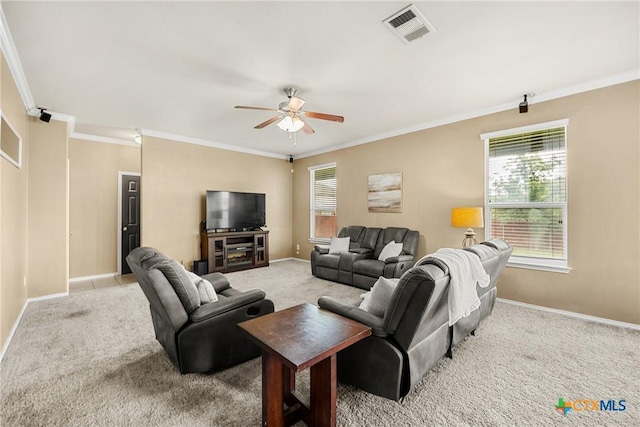 1103 Sugar Brook Dr, Temple, TX 76502 - living area with ornamental molding, light carpet, and a ceiling fan