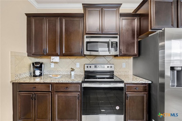 1103 Sugar Brook Dr, Temple, TX 76502 - kitchen featuring appliances with stainless steel finishes, dark brown cabinetry, crown molding, light stone counters, and tasteful backsplash