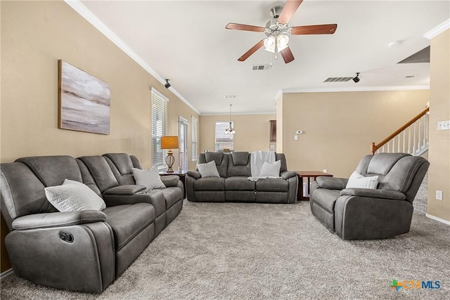 1103 Sugar Brook Dr, Temple, TX 76502 - carpeted living room featuring a ceiling fan, crown molding, and stairs