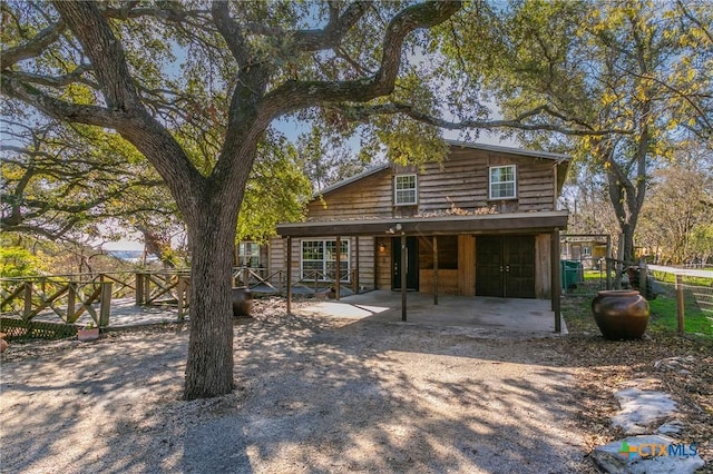 view of log cabin