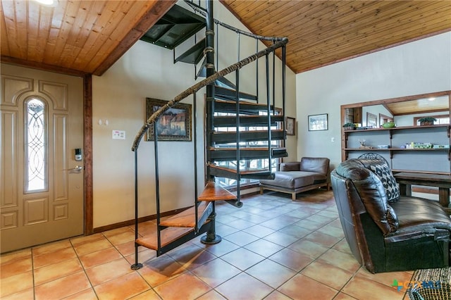 tiled foyer featuring high vaulted ceiling and wooden ceiling