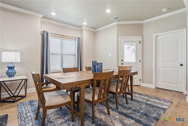 2085 Mercer St, Nolanville, TX 76559 - dining area featuring light wood-style floors, baseboards, crown molding, and recessed lighting