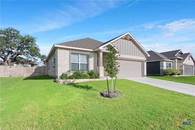 2085 Mercer St, Nolanville, TX 76559 - view of front of house featuring board and batten siding, a garage, and driveway