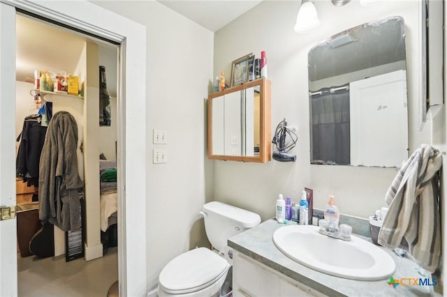 420 Mill Rd, Maxwell, TX 78656 - full bath featuring concrete flooring, toilet, and vanity