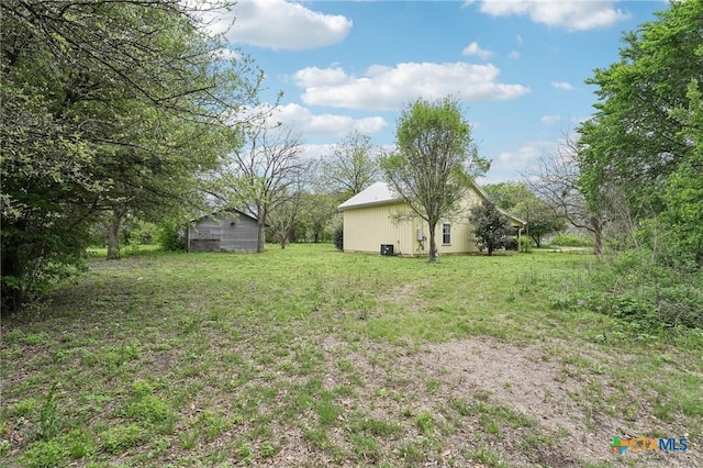 420 Mill Rd, Maxwell, TX 78656 - view of yard featuring an outdoor structure
