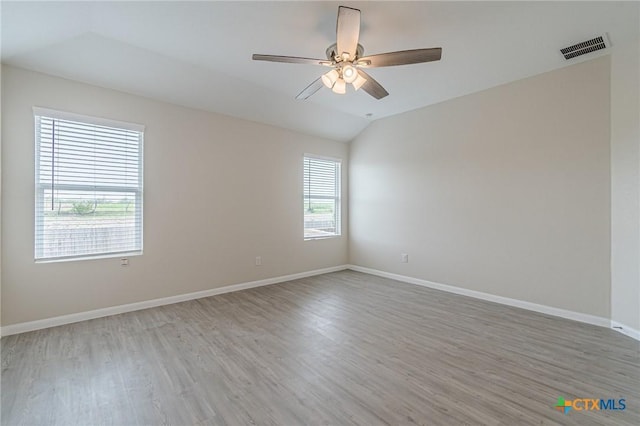 2824 Green Finch, New Braunfels, TX 78130 - empty room with light wood-style floors, ceiling fan, baseboards, and lofted ceiling