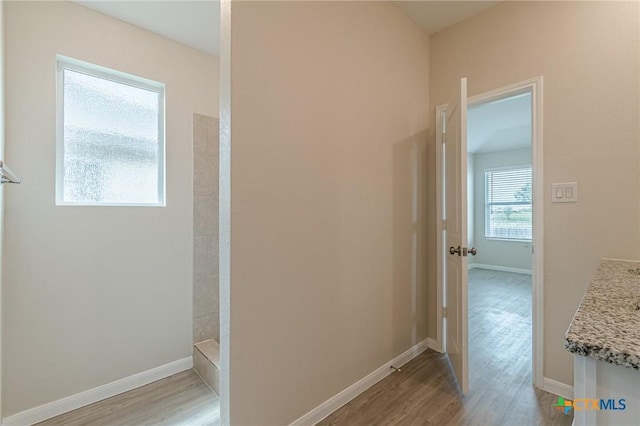 2824 Green Finch, New Braunfels, TX 78130 - hallway with light wood finished floors and baseboards