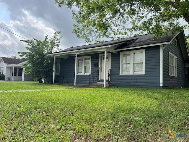 ranch-style house with a front yard
