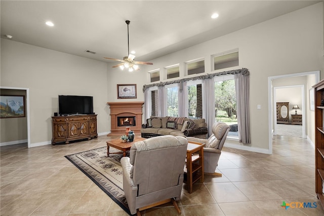 959 Wilderness Trl, New Braunfels, TX 78132 - living area featuring a high ceiling, baseboards, ceiling fan, recessed lighting, and light tile patterned flooring