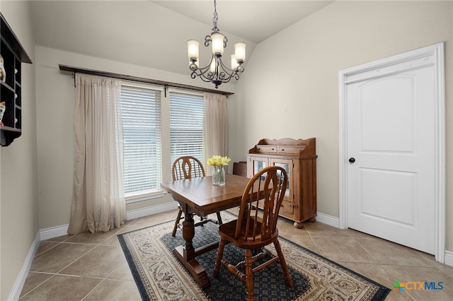 959 Wilderness Trl, New Braunfels, TX 78132 - dining room with vaulted ceiling, a chandelier, light tile patterned floors, and baseboards