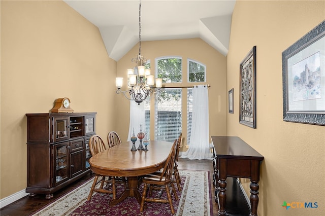 959 Wilderness Trl, New Braunfels, TX 78132 - dining space featuring a chandelier, dark wood-type flooring, baseboards, and vaulted ceiling