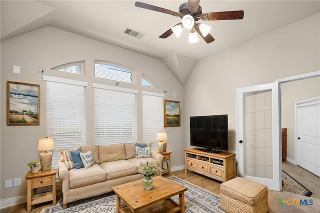 959 Wilderness Trl, New Braunfels, TX 78132 - living area featuring lofted ceiling, ceiling fan, baseboards, and light wood-style floors