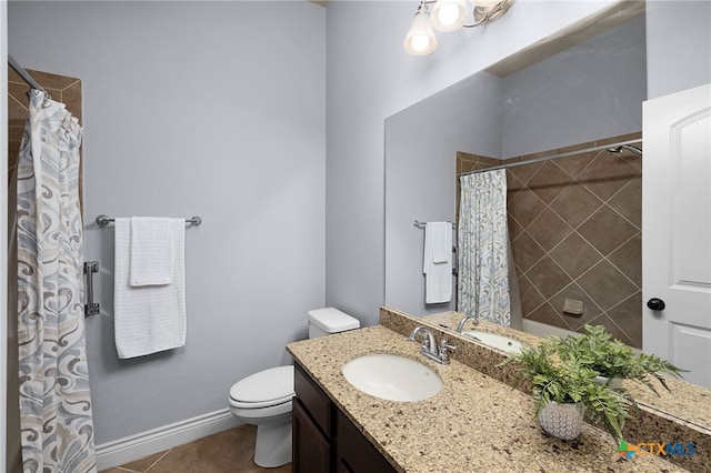959 Wilderness Trl, New Braunfels, TX 78132 - full bath with toilet, vanity, curtained shower, baseboards, and tile patterned flooring
