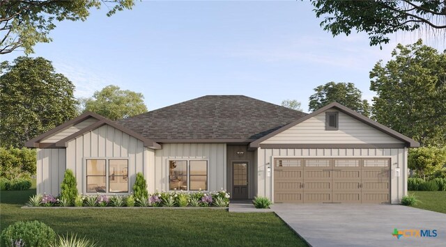 view of front of property with a garage, driveway, a front lawn, and board and batten siding