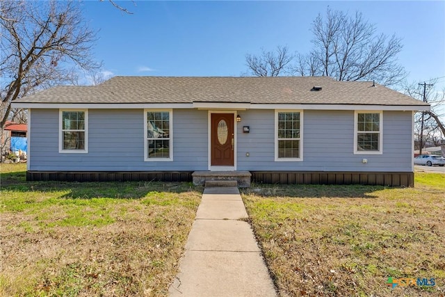 view of front of house with a front lawn