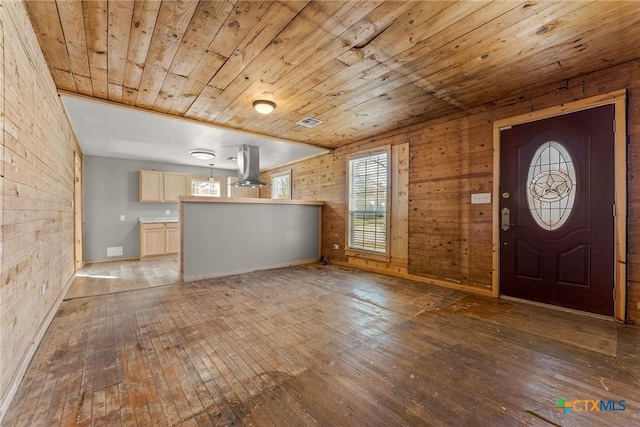 foyer entrance featuring wooden ceiling and dark wood-type flooring