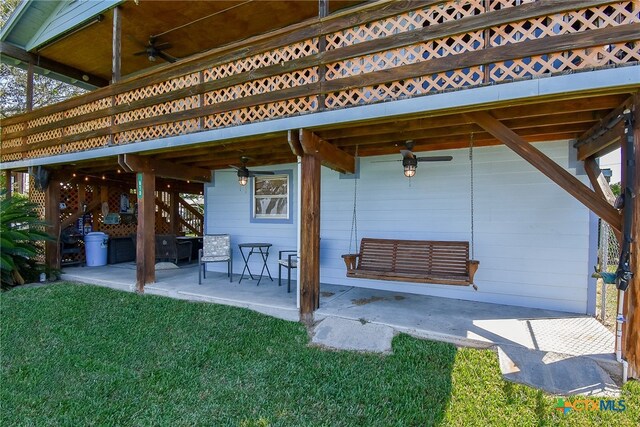 view of patio / terrace featuring ceiling fan