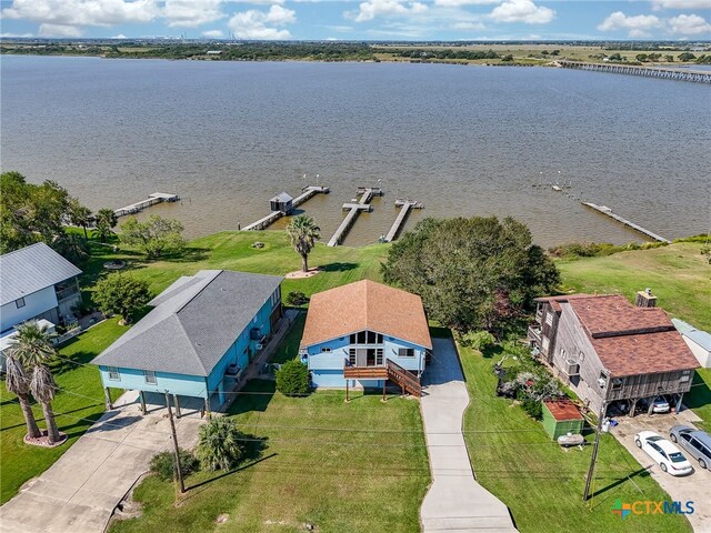 aerial view featuring a water view