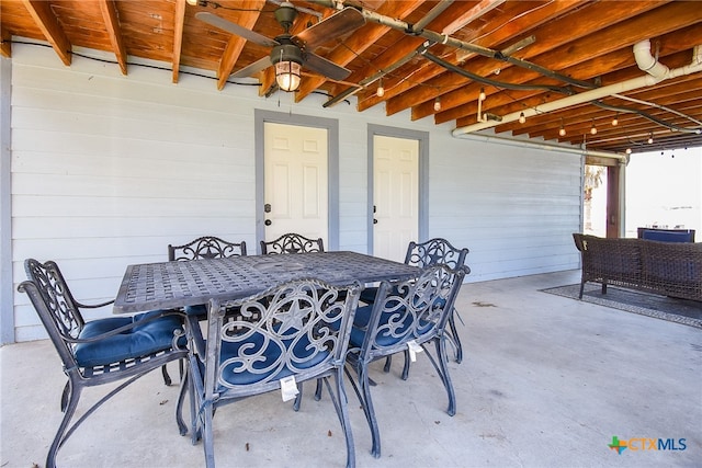 view of patio featuring ceiling fan