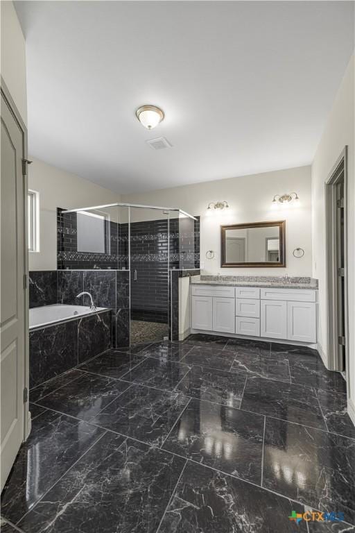 bathroom featuring plus walk in shower and vanity