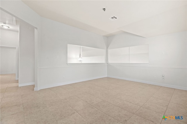 3437 De Soto Loop, Round Rock, TX 78665 - tiled spare room with baseboards and a pendent fire sprinkler