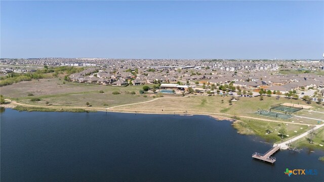 3437 De Soto Loop, Round Rock, TX 78665 - aerial view of property and surrounding area featuring a large body of water and nearby suburban area