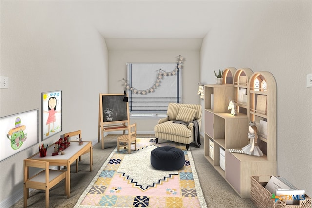 living area with carpet flooring, a healthy amount of sunlight, and lofted ceiling