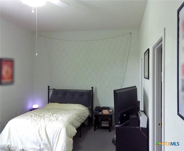 618 Pecos St, Lockhart, TX 78644 - carpeted bedroom with ceiling fan