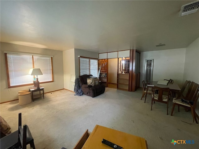 220 Davis Ave, Port Lavaca, TX 77979 - carpeted living room with baseboards