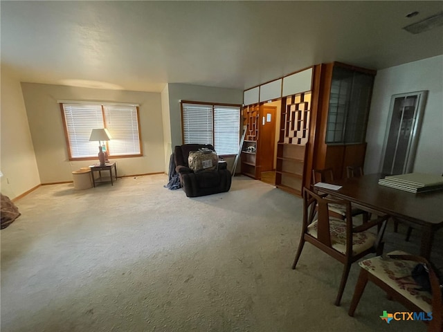 220 Davis Ave, Port Lavaca, TX 77979 - sitting room with plenty of natural light, carpet, and baseboards