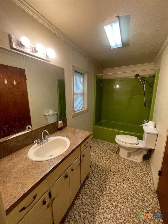 220 Davis Ave, Port Lavaca, TX 77979 - bathroom featuring toilet, vanity, ornamental molding, and shower / tub combination