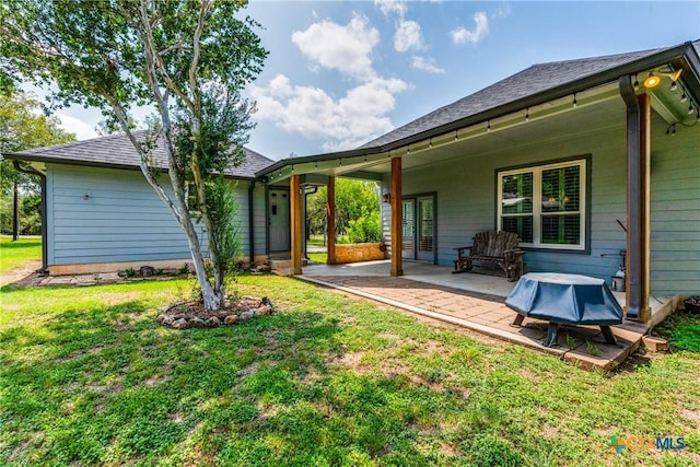 425 County Road 3830, San Antonio, TX 78253 - rear view of property featuring a yard and a patio
