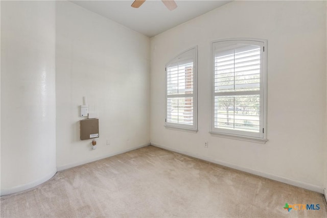 425 County Road 3830, San Antonio, TX 78253 - carpeted empty room with healthy amount of natural light, ceiling fan, and baseboards