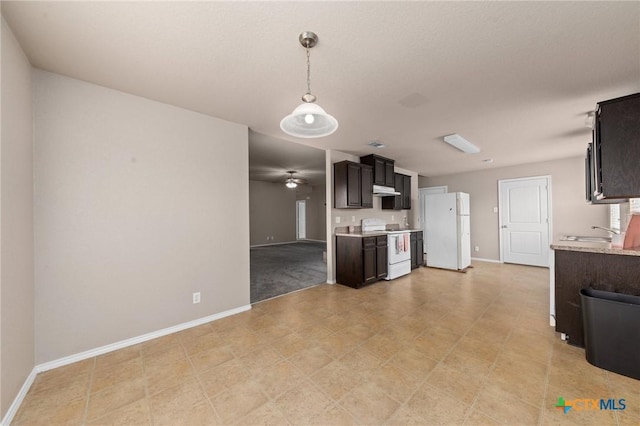 kitchen featuring dark brown cabinetry, white appliances, decorative light fixtures, and ceiling fan