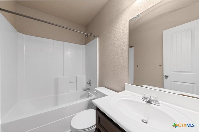 full bathroom featuring vanity, toilet, and shower / bath combination