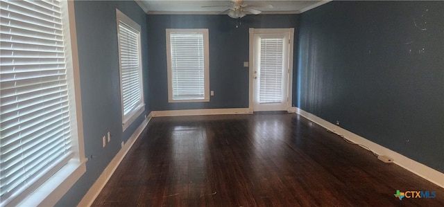 267 Illinois St, Bloomington, TX 77951 - spare room featuring baseboards, wood finished floors, crown molding, and ceiling fan