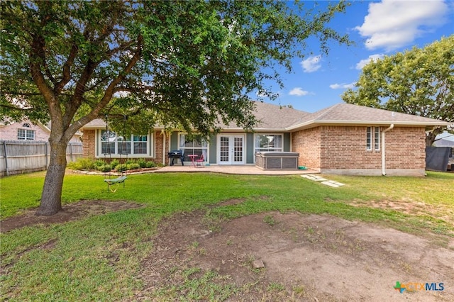 509 Sapphire Blvd, Hewitt, TX 76643 - rear view of property featuring french doors, brick siding, a patio, and central air condition unit