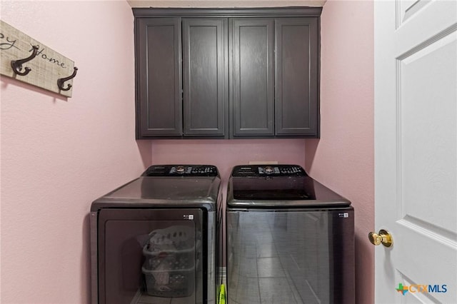 509 Sapphire Blvd, Hewitt, TX 76643 - washroom featuring separate washer and dryer and cabinet space