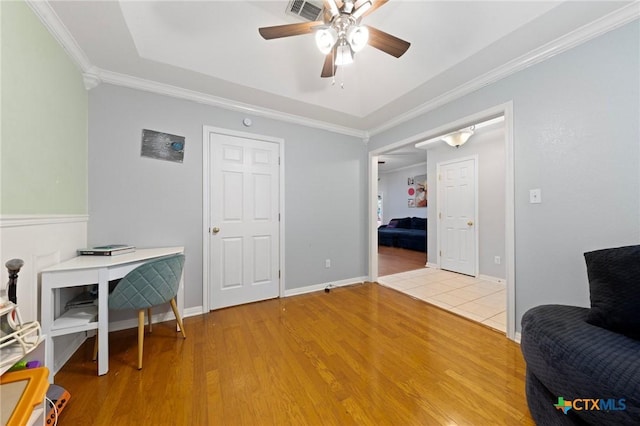 509 Sapphire Blvd, Hewitt, TX 76643 - home office with a ceiling fan, wood finished floors, crown molding, and baseboards