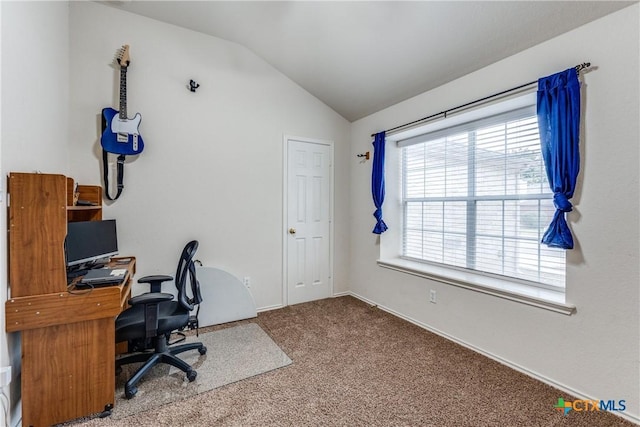 office area with vaulted ceiling and carpet