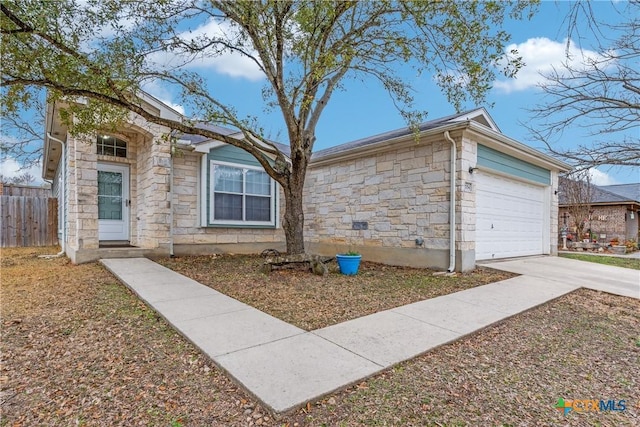 single story home featuring a garage