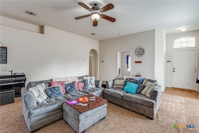 living room featuring ceiling fan