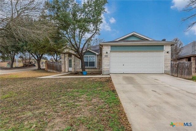 2154 Hidden Mdw, New Braunfels, TX 78130 - ranch-style home featuring concrete driveway, a garage, fence, and a front yard