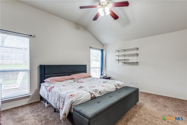 bedroom with lofted ceiling, carpet flooring, and ceiling fan