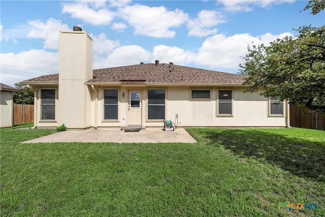1007 Judy Ln, Copperas Cove, TX 76522 - rear view of property featuring a chimney, a patio area, and roof with shingles