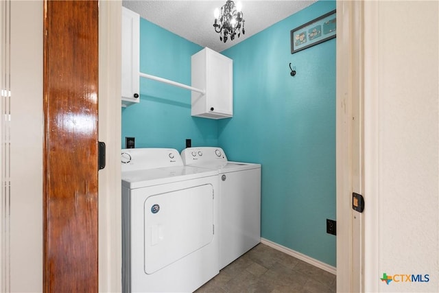 1007 Judy Ln, Copperas Cove, TX 76522 - laundry room with cabinet space, washer and dryer, and a textured ceiling